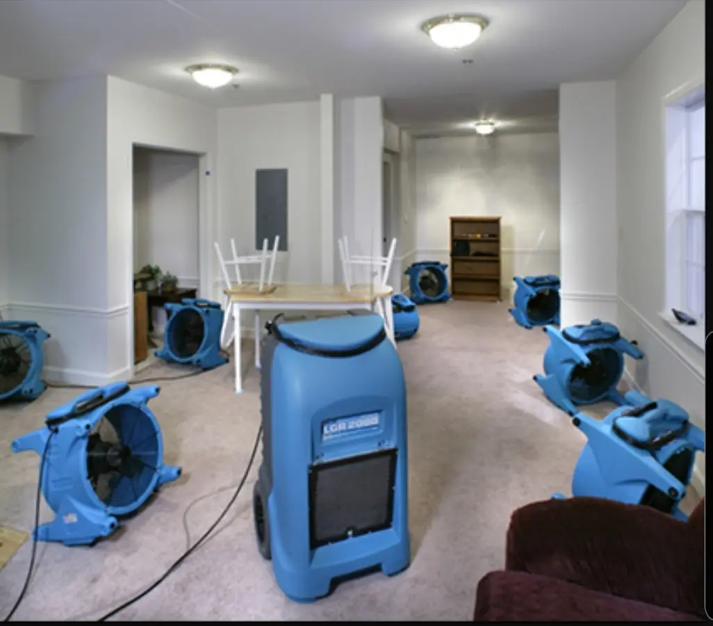 Air movers and dehumidifier setup for Water Damage Restoration in Sulphur